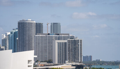 Fototapeta premium Telephoto image of bayfront condominiums and hotel buildings Miami Midtown Edgewater