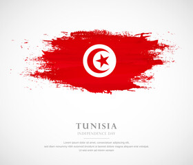 Abstract watercolor brush stroke flag for independence day of Tunisia