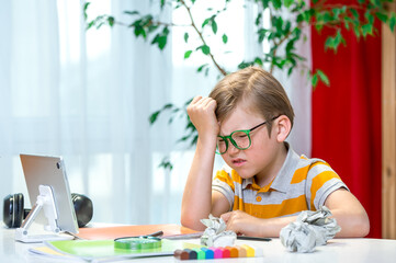 It's catastrophe. Kid forgetting something Portrait of sad upset terrified boy holding touching...