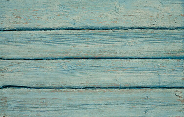 Texture of old wooden planks painted in blue