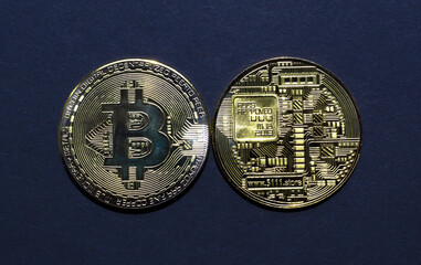 Bitcoin BTC crypto currency gold coin, new virtual money concept. Mining or blockchain technology. Top view