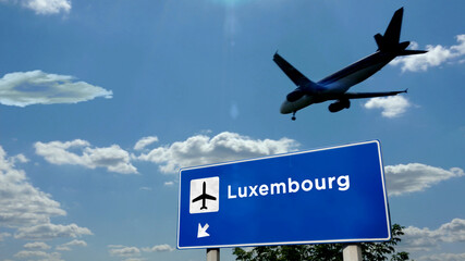 Plane landing in Luxembourg airport with signboard