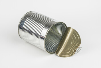 Empty open aluminum can on white background