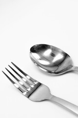 A set of cutlery from a fork, a spoon on a white background.