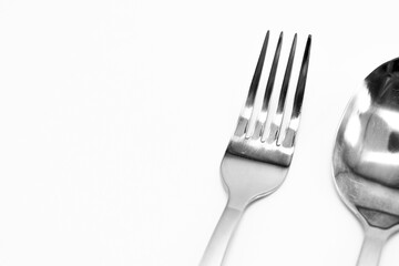 A set of cutlery from a fork, a spoon on a white background.