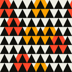 Seamless black triangles and abstract orange and yellow background. Decorative triangles tile.