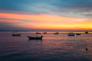 Fototapeta na wymiar The boats and sunset