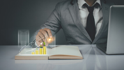 Business people are using Stock chart innovative technology. Mixed media, digital and online concept.