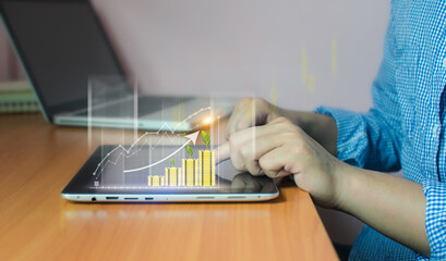 Business people are using Stock chart innovative technology. Mixed media, digital and online concept.