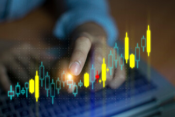 Business people are using Stock chart innovative technology. Mixed media, digital and online concept.
