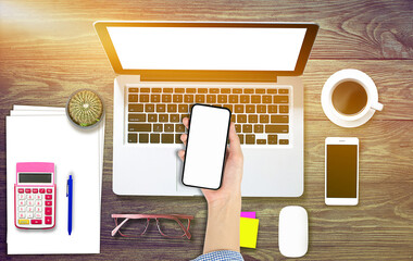 Top view over the tablet computer notebook with office style wooden floor.