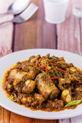 Stir fry pork rib with red curry