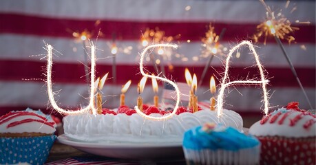 Composition of sparkling usa text over birthday cake and cupcakes over american flag