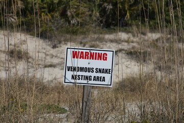 Venomous Snake Nesting Area Sign In Dunes