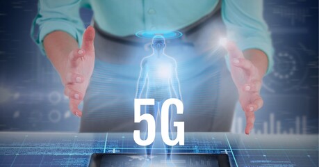Composition of 5g text over midsection of businesswoman and human model on tablet screen