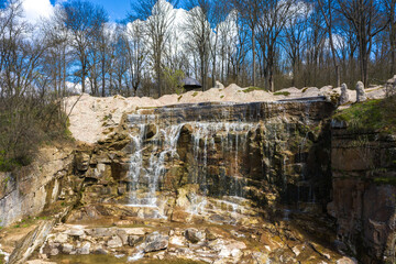 Fototapeta na wymiar Beautiful cascade waterfall in Sofiyivka park in Uman, Ukraine