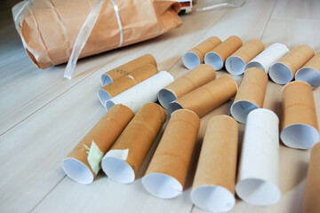 tokyo, japan, 22-09-2020, A big number of finished toilet paper rolls spreaded on the floor.