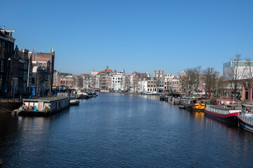 Fototapeta na wymiar View From The Blauwbrug Bridge At Amsterdam The Netherlands 25-3-2020
