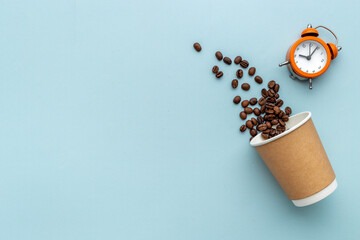 Paper coffee cups with coffee beans. Top view