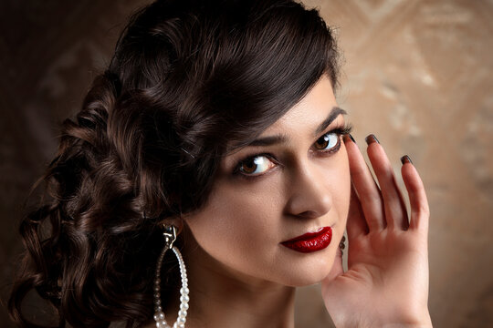 Retro woman portrait. Luxurious lady in vintage style from 20s or 30s.