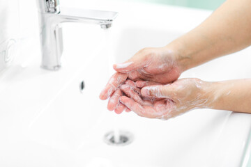 thorough hand washing with soap and water to prevent coronavirus - Image