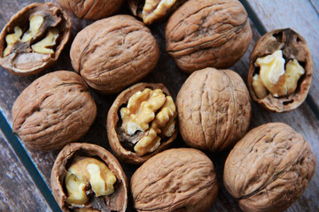 natural walnut fruit in a hard brown shell