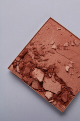 cosmetics shadow tester on colored background