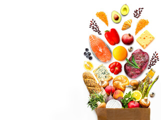 Full paper bag with healthy food.Healthy food background.Supermarket food concept. World Food Day.A complete package of healthy products from the supermarket.Shopping at the supermarket.Home delivery.