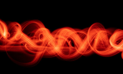 Abstract red waves and loops  background on black.