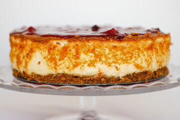 cheesecake with red berries and a biscuit base