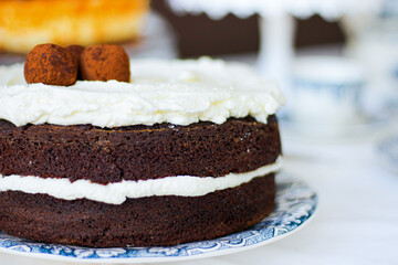 Chocolate and cream cake with truffles