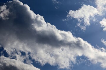 Naklejka na ściany i meble The clouds in the blue sky float beautifully
