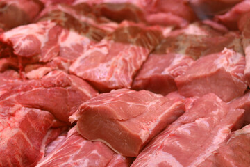 fresh raw boneless pork shoulder butt slices. Top view.