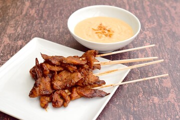 Indonesian chicken satay or Sate Ayam with peanut sauce