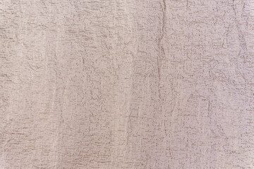 Beige textured background with cracks