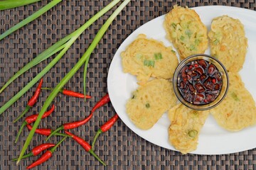 Traditional indonesian food. Tempe Mendoan. Indonesian Street Food, Tempe goreng tepung or fried flour tempe. Served with chilli sweet soy sauce