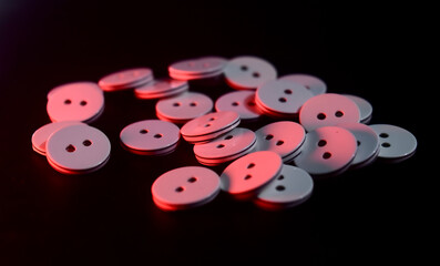 buttons on a red