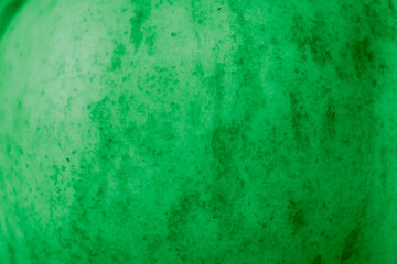 green apple skin with visible details. background