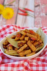 Indonesian Cuisine Tempeh Sticks cooked in Indonesian thick sweet soy sauce, 