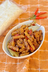Indonesian Cuisine Tempeh Sticks cooked in Indonesian thick sweet soy sauce, 