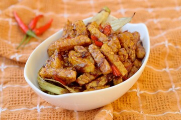 Indonesian Cuisine Tempeh Sticks cooked in Indonesian thick sweet soy sauce, 