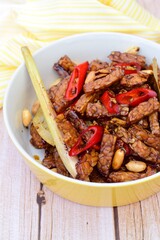Famous Indonesian Food; Spicy Tempeh Sweet Soy Sauce with Peanut (Orek Tempe)