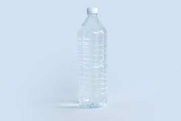 A plastic bottle of drinking water isolated on white background.