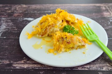 Pisang Goreng or fried banana with grated cheese and condensed milk