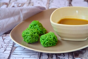 Putu Mayang with Palm sugar sauce. Traditional Indonesian Dessert