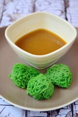 Putu Mayang with Palm sugar sauce. Traditional Indonesian Dessert