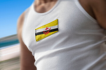 The national flag of Brunei on the athlete's chest