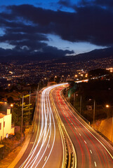 expressway light trail, Funchal city on background
