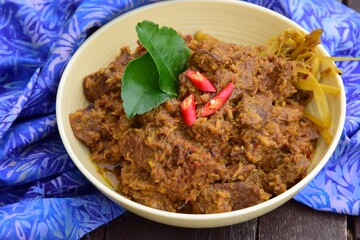 Beef Rendang or spicy beef stew. The popular dish from West Sumatran, Indonesia 