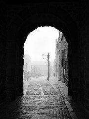 Fog through one of the arches of the Avila's Wall